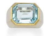 an image of a ring with a blue topazt stone in it