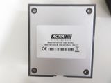 an image of a close up of a metal plate with a barcode on it