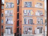 a picture of a picture of a building with books on it