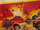 movie poster of a group of people in front of a volcano