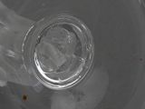 a glass of water with ice inside of it