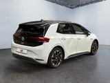 the rear end of a white volkswagen e - golf in a showroom