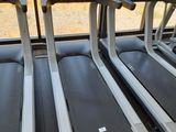 three treads in a row in a gym room
