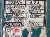 a close up of a sign on the side of a blue machine
