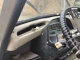 a view of a dashboard from inside of a car