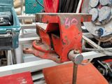 many different types of tools on the shelf