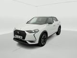 a white car in a white room with a white background