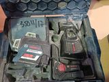 a tool box with tools inside of it on a table