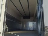 a white truck that is parked in a parking lot