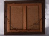 an old wooden window with a rope hanging from it ' s side