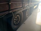 a truck that is parked on the side of the road