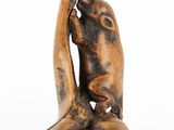sculpture of a woman holding a baby in her arms