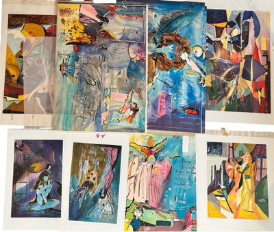 de nombreux tableaux de différentes couleurs et tailles accrochés au mur