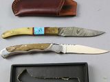 three different types of knives in a box on a table