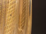 a glass vase that is sitting on a table