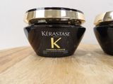two jars of keraspasse sitting on a table