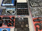 a lot of tools that are sitting on the floor
