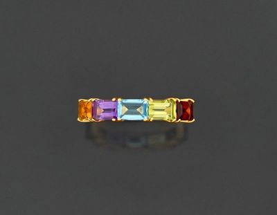 Bague raimbow en or jaune 18K 750 millièmes ornée d'une lign…