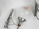 a light that is sitting on a table next to a pair of scissors