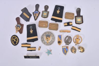 a lot of pins and badges on a white surface