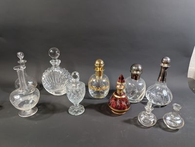 a lot of glass bottles that are sitting on a table