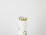 a white vase with a picture of a man and a woman on it