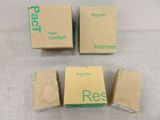 three boxes of different sizes and colors of the same product