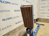 an image of a piece of wood being used to build a wall