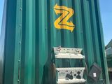 a green container with a yellow z logo on it