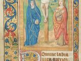 an old book with a painting of jesus on the cross