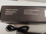a box with a keyboard and a mouse on the table