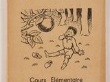 un vieux livre sur lequel figure le dessin d'un garçon en train de frapper un ballon de foot