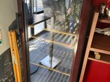 a glass door that is open in a room