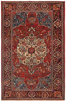 a red and blue rug with a medallion design on it