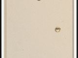 an old picture of a picture of a door with a button on it