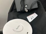 a laptop and other electronics sitting on a table