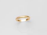 a gold ring on a white background