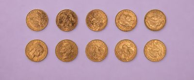 un groupe de pièces d'or sur fond violet
