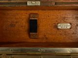 a close up of a wooden box with a label on it