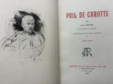 an open book with a drawing of a man sitting in a chair
