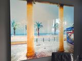 a picture of a painting on the wall of a room