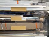 a lot of boxes that are stacked up on a shelf
