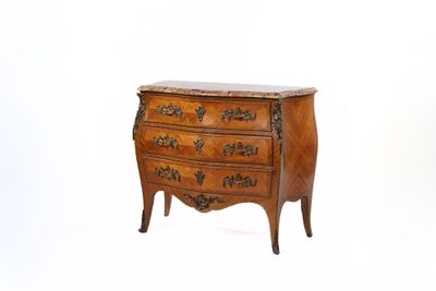 a small wooden chest of drawers with a marble top