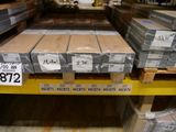 many stacks of boxes on a shelf in a store