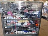 a metal cart with many items in it in a warehouse