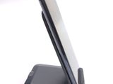 a cell phone that is sitting on top of a stand