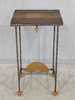 an image of a small table with a wooden top and metal legs
