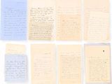 several pieces of paper with handwriting on them sitting next to each other