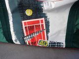 a bag that has a picture of a tennis ball on it