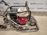 a small machine that is sitting on the ground